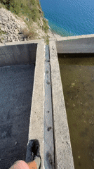 Person explores abandoned concrete structure on Montenegro coast
