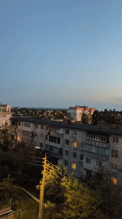 Sunset captured over Soviet-era apartments in Tiraspol, Moldova