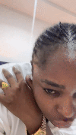 Person in white shirt recorded in Abuja bedroom