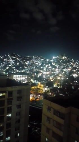 Early morning domestic life documented in Caracas neighborhoods