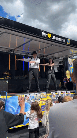 Edeka promotional street performance draws crowds in Heinebach