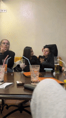 Young women socialize at cafe in Gabrovo, Bulgaria