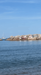 Sunny beach day captured in Barcelona coastal photograph