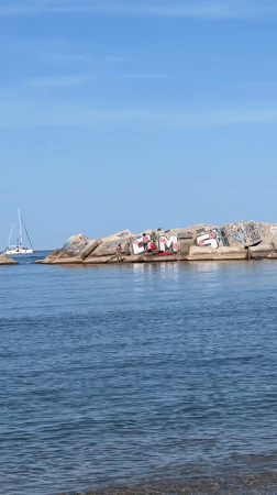 Sunny beach day captured in Barcelona coastal photograph
