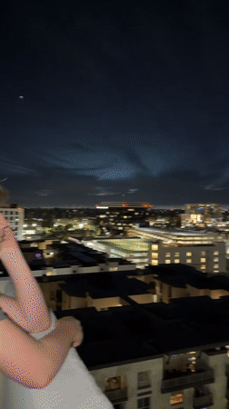 July 4th fireworks over LA, shot from a high-rise balcony