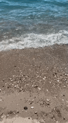 Peaceful beach day captured at Montenegro coastal resort