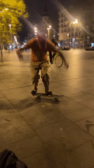 Nighttime street activities captured in urban plaza setting
