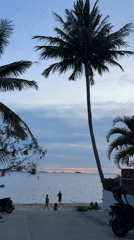 Dusk beach scene captured in Baan Sri Thanu, Thailand