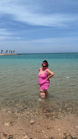Woman enjoys morning beach time in Hurghada, Egypt