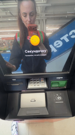 Woman conducts late-night errands in Birobidzhan, Russia