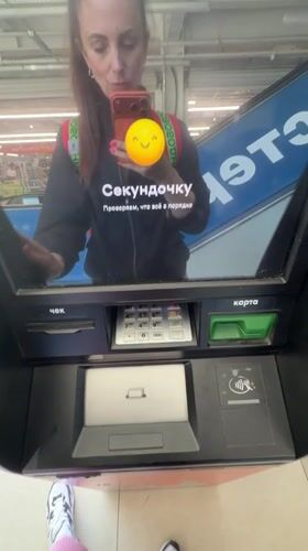 Woman conducts late-night errands in Birobidzhan, Russia