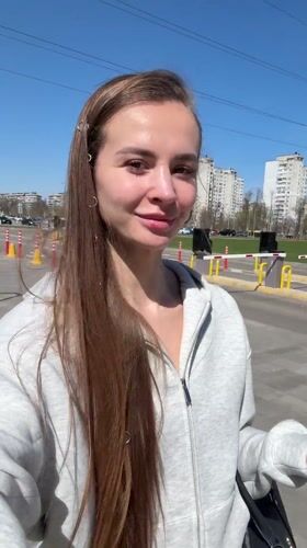 Woman in grey hoodie spotted in Kyiv street