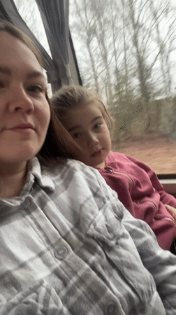 Woman and child travel together in vehicle near Kukui