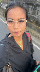 Woman records selfie video while walking in Sibanggede