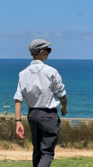 Tel Aviv beachfront morning: surfers, dog walkers, and sea views