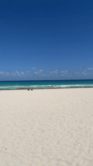 Clear skies over Playa del Carmen beach scene captured