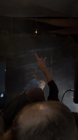 Live DJ set and stage performance at a Moscow nightclub