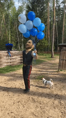 Group celebrates with life-size caricature figure in Noviy, Russia