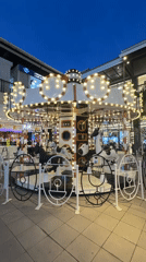 Evening carousel operates in Baan Chaweng plaza
