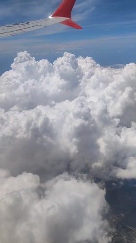 Passenger documents morning flight views over Tangerang coastal areas
