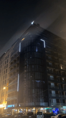 Modern apartment building filmed at night in Batumi, Georgia