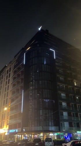 Modern apartment building filmed at night in Batumi, Georgia