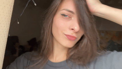 Woman records selfie videos in Krasnoyarsk early morning session