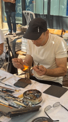 Artisans work at outdoor craft market in Tel-Aviv