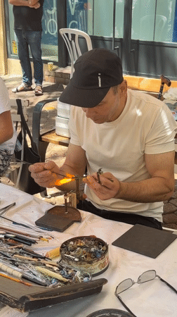 Artisans work at outdoor craft market in Tel-Aviv
