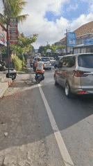 Morning traffic flows through Kuta Selatan streets