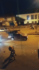 Busy nighttime urban street activity documented by witnesses