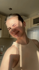 Woman cooks breakfast in Saint Petersburg kitchen Friday morning