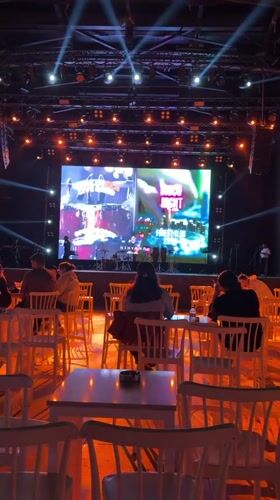 Outdoor event venue prepared with stage, seating in Kemer