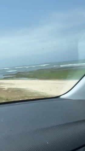 Vehicle passenger films coastal view in Moulay Abdallah, Morocco