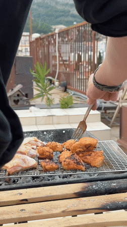 Rooftop barbecue and screen setup in Budva, Montenegro