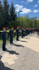 Children participate in outdoor ceremony at Ufa park gathering