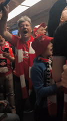 Spartak Moscow fans celebrate on crowded subway car