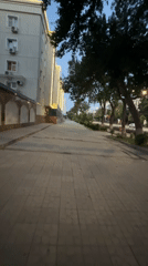 Evening walk through modern Tashkent streetscape with landscaping