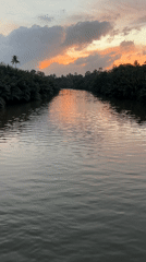 Sunset river scene in Kadewatta with colorful sky
