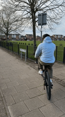 Cyclist and Corgi spotted during afternoon activity in Coventry