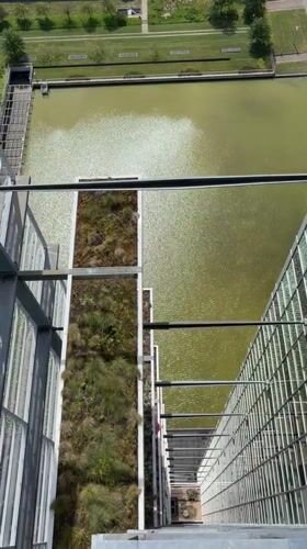 Observer documents aerial views from glass observation deck in Rijswijk