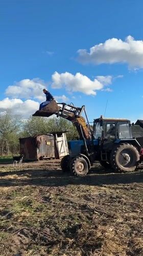 Family farm gathering with tractor work, livestock in Lukintsy