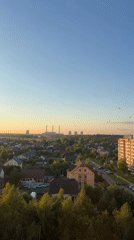 Drone sweeps a Minsk suburb through a long summer sunset