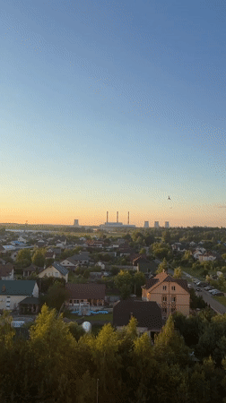 Aerial golden hour views over Minsk suburbs, Belarus