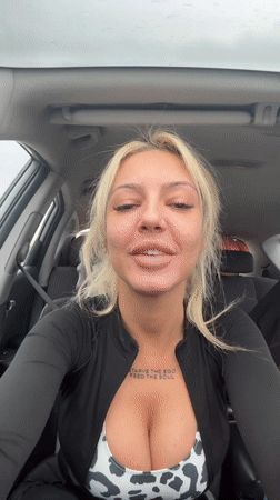 Woman in cow-print attire observed in car in Bulgaria