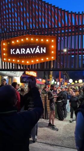 Budapest street food market bustling during evening hours