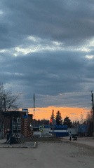 Child observed at sunset in Chernushka, Russia street scene