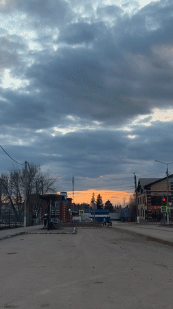 Child observed at sunset in Chernushka, Russia street scene