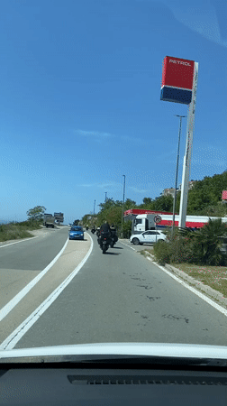 Motorcycles travel sunny roads in Krstac, Montenegro