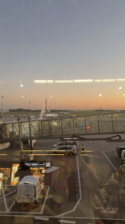 Boarding a flight from Warsaw to Palma at sunset